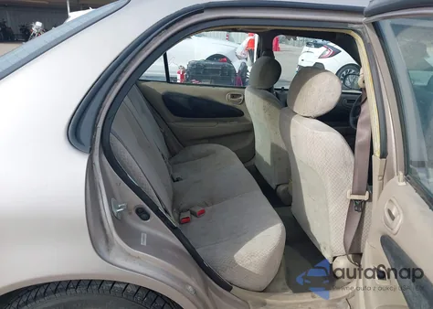 2000 Toyota Corolla Ce из США, поврежденный, VIN 1NXBR12EXYZ337319